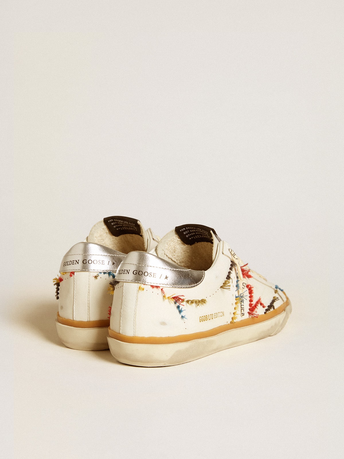Golden Goose Women’s Super-Star LTD with perforated star and metallic leather heel tab