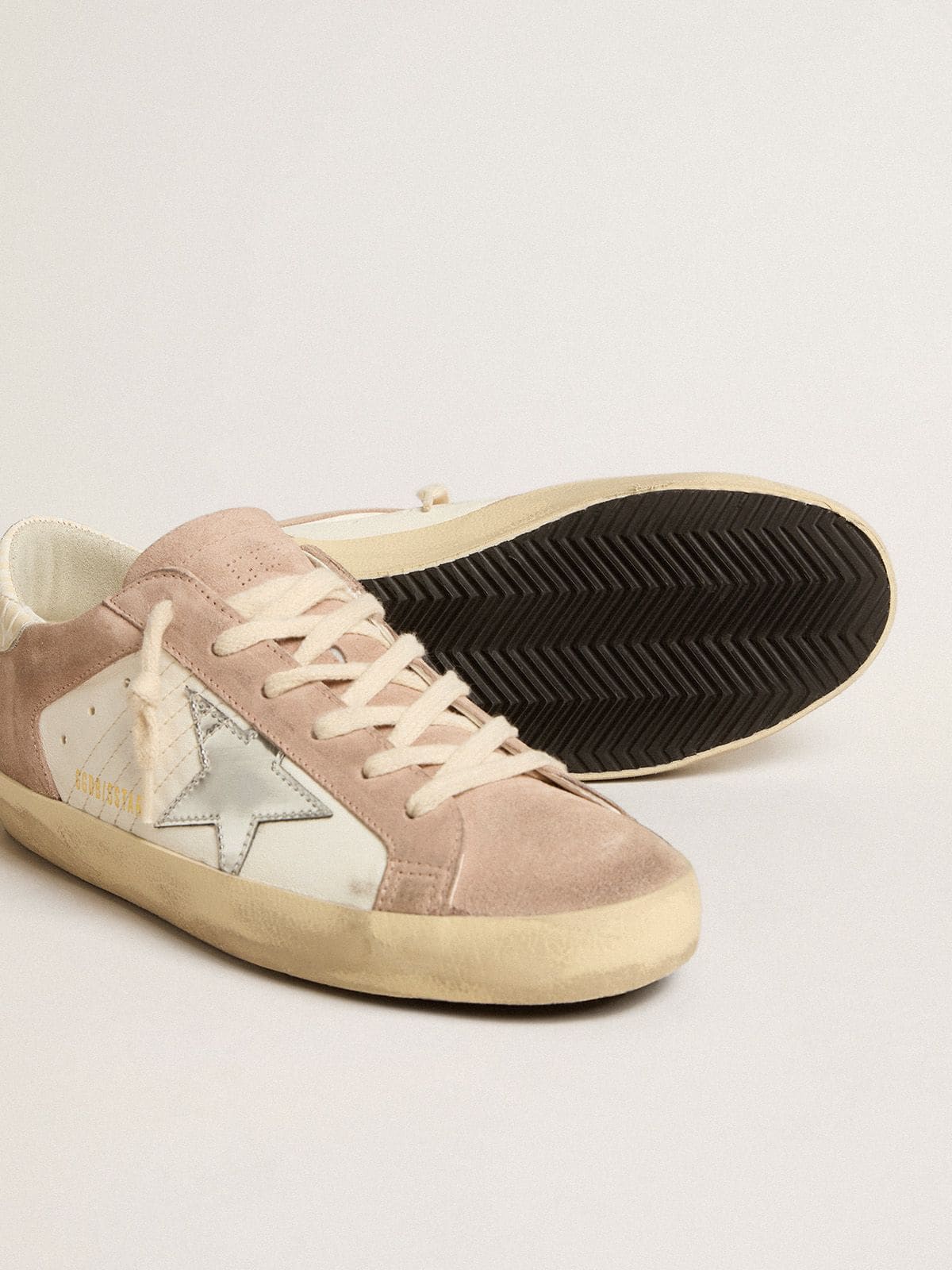 Golden Goose Women’s Super-Star sneakers in pink suede with silver metallic leather star