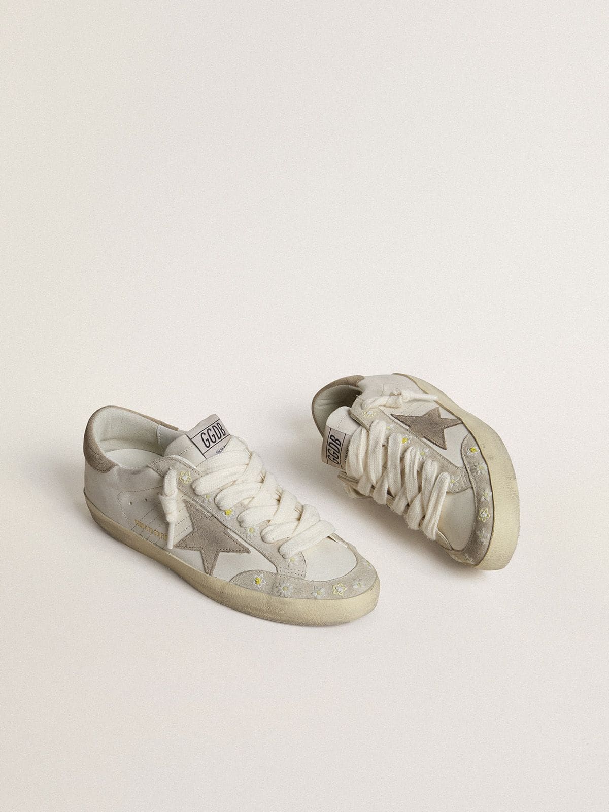 Golden Goose Women’s Super-Star LTD with beige suede star and heel tab and floral embroidery