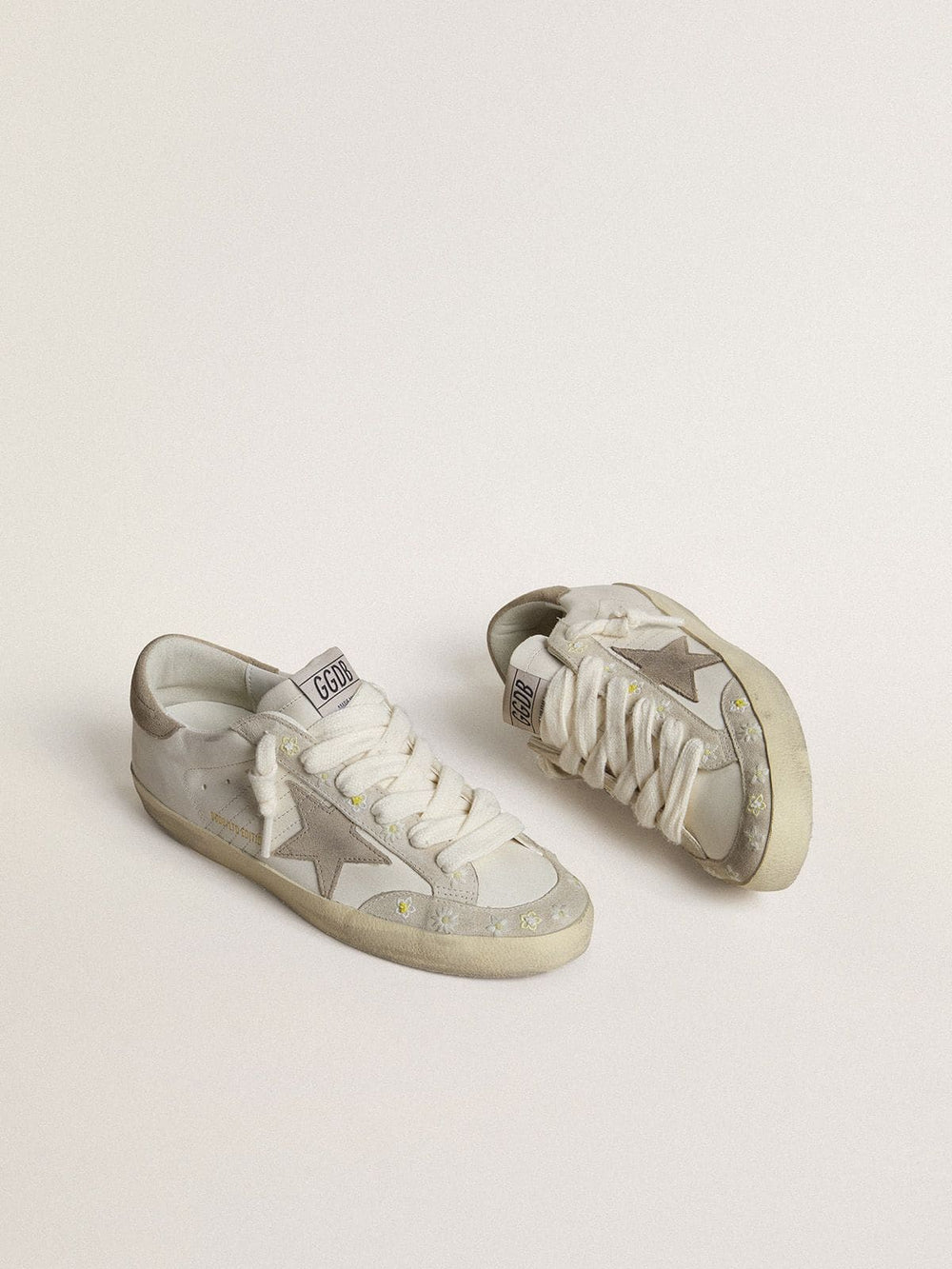 Golden Goose Women’s Super-Star LTD with beige suede star and heel tab and floral embroidery