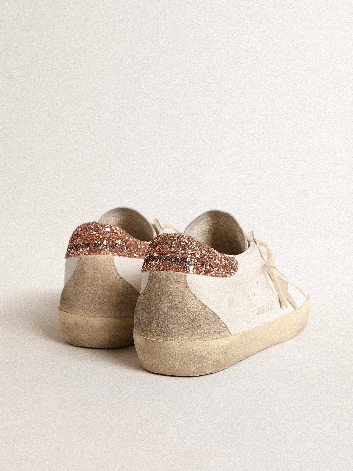 Golden Goose Women's Super-Star with a suede star and peach-pink glitter heel tab
