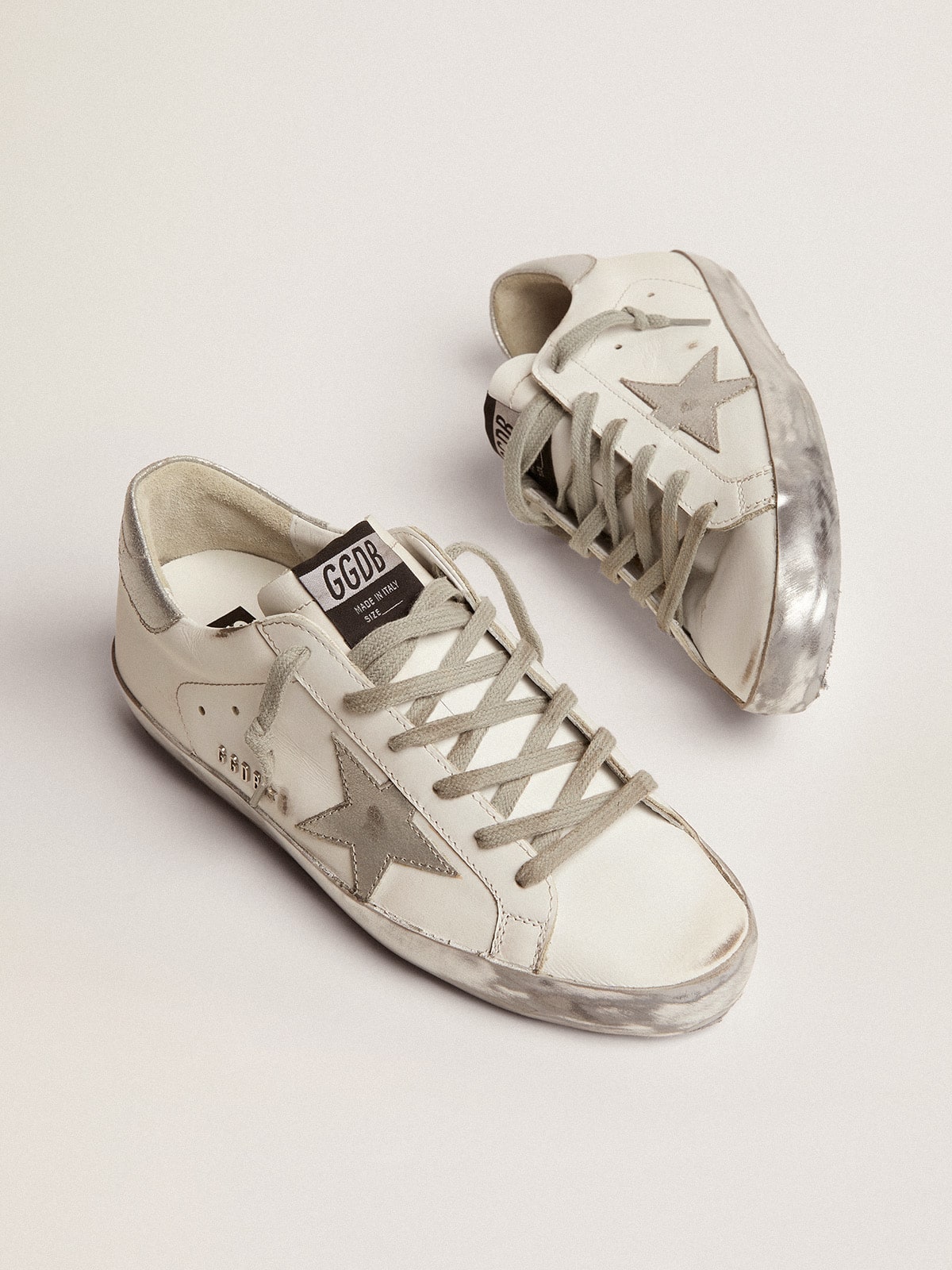 Golden Goose Women's Super-Star with silver sparkle foxing and metal stud lettering