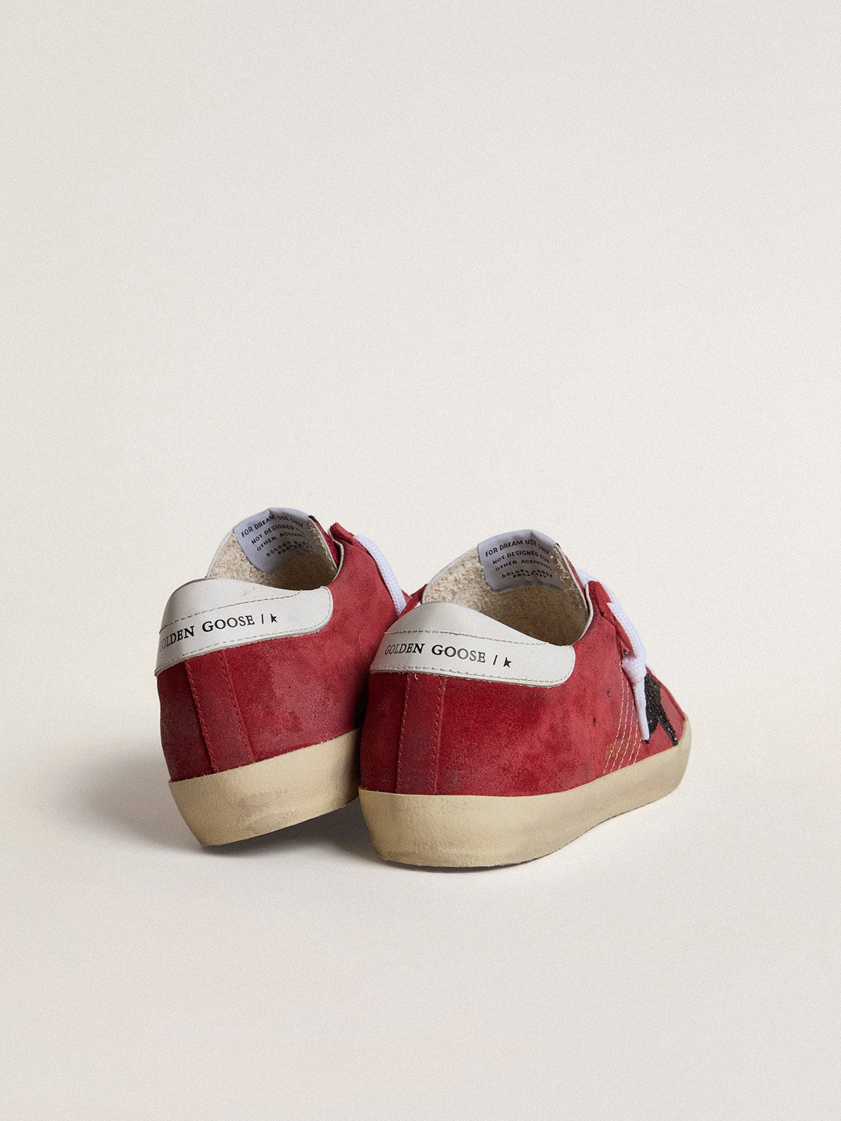 Golden Goose Women’s Super-Star in red suede with glitter star and white heel tab