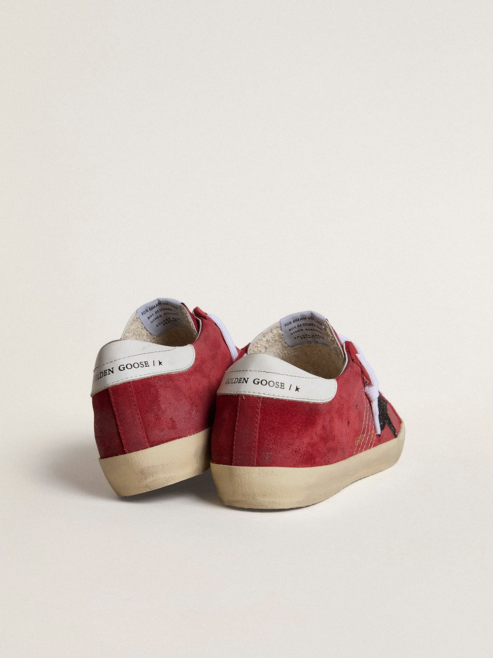 Golden Goose Women’s Super-Star in red suede with glitter star and white heel tab