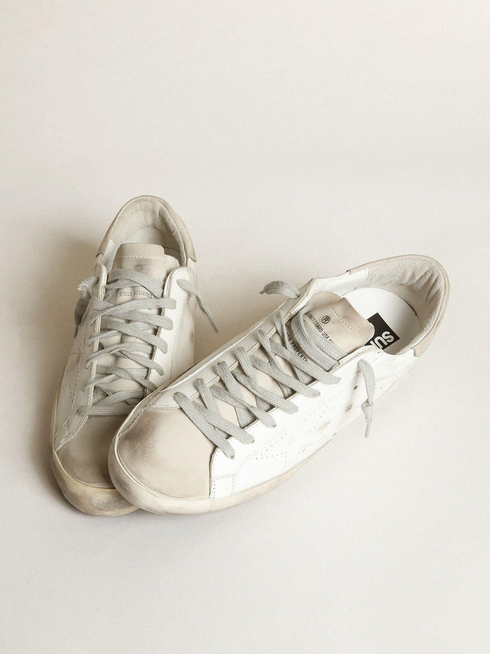 Golden Goose Women's Super-Star in white leather with perforated star and beige nubuck heel tab