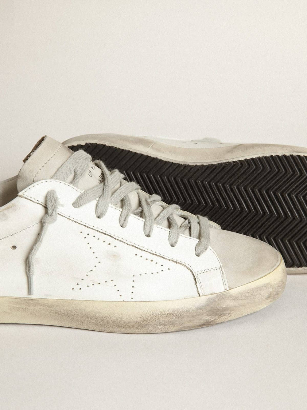 Golden Goose Women's Super-Star in white leather with perforated star and beige nubuck heel tab