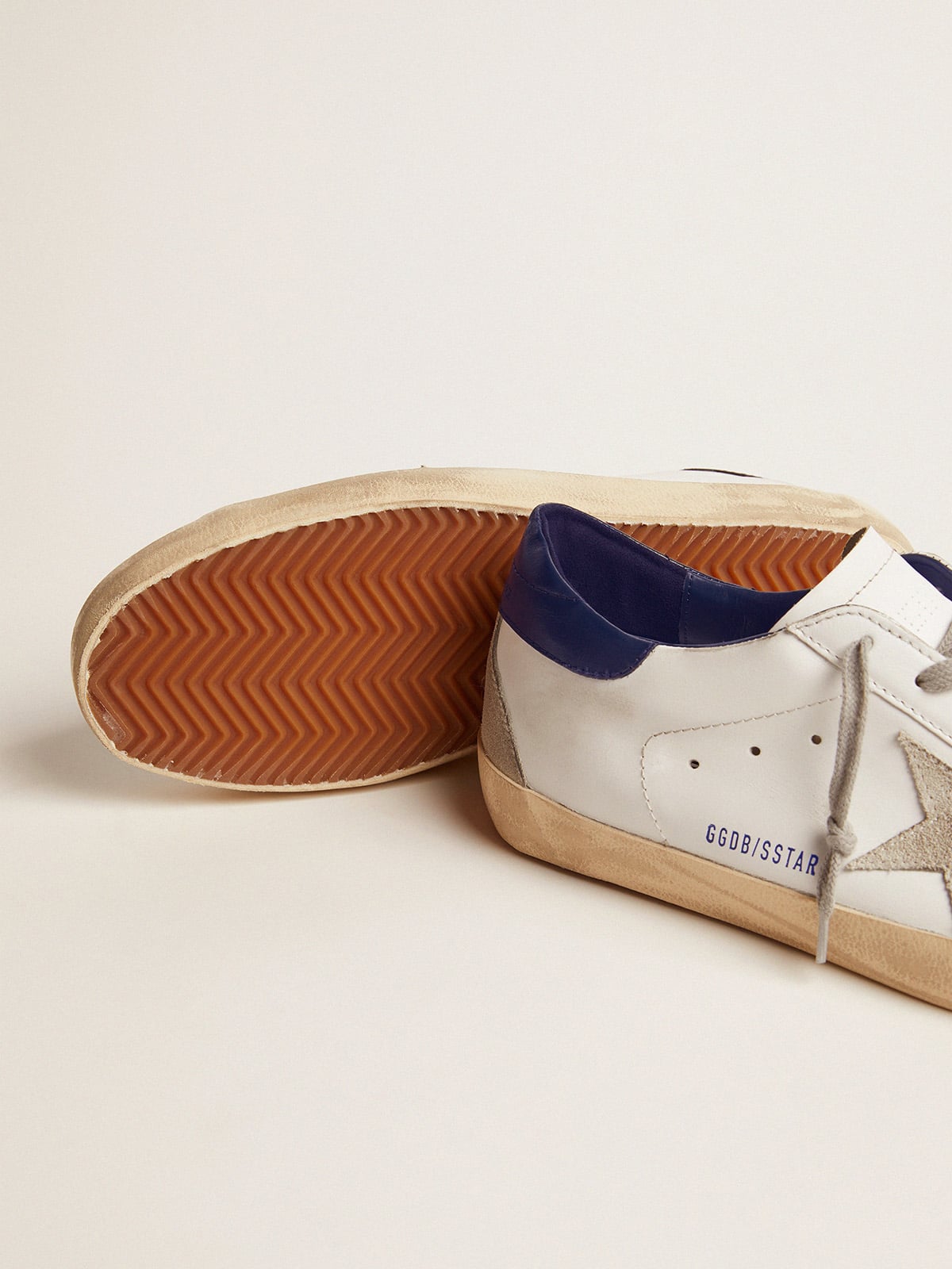 Golden Goose Women's blue and white Super-Star sneakers | Golden Goose
