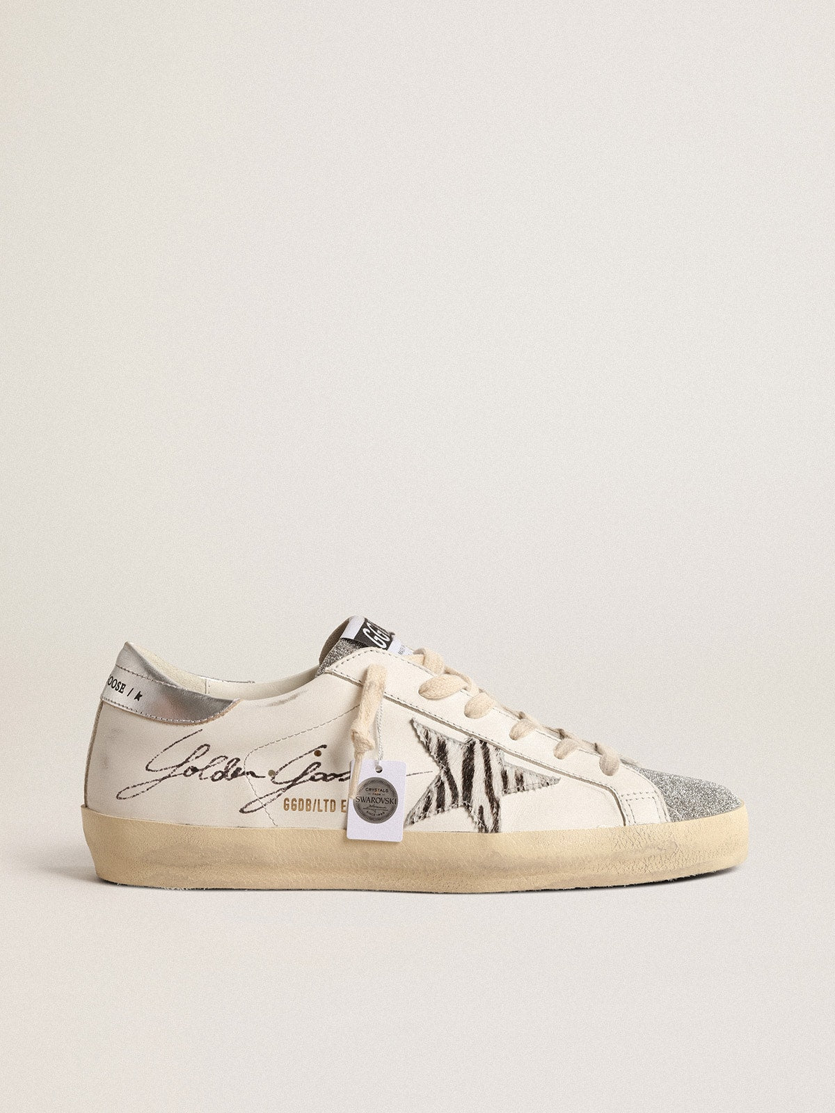 Golden Goose Super-Star with silver Swarovski crystal tongue