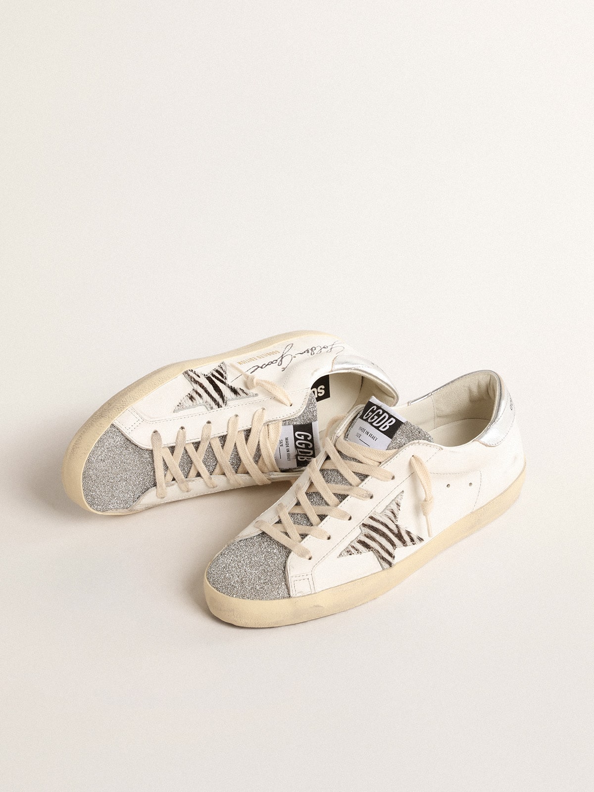 Golden Goose Super-Star with silver Swarovski crystal tongue