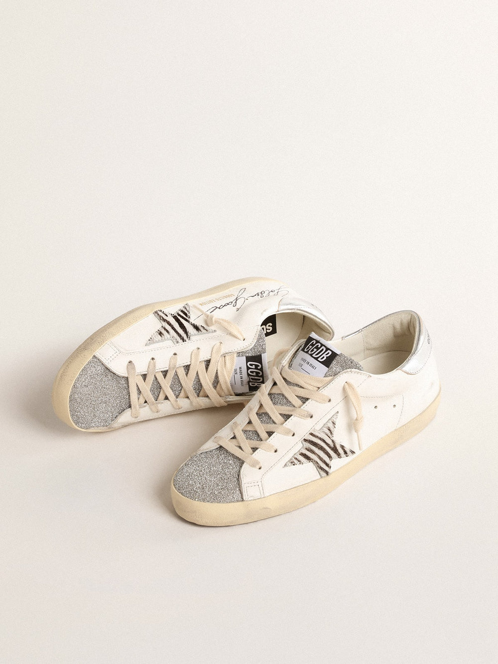 Golden Goose Super-Star with silver Swarovski crystal tongue