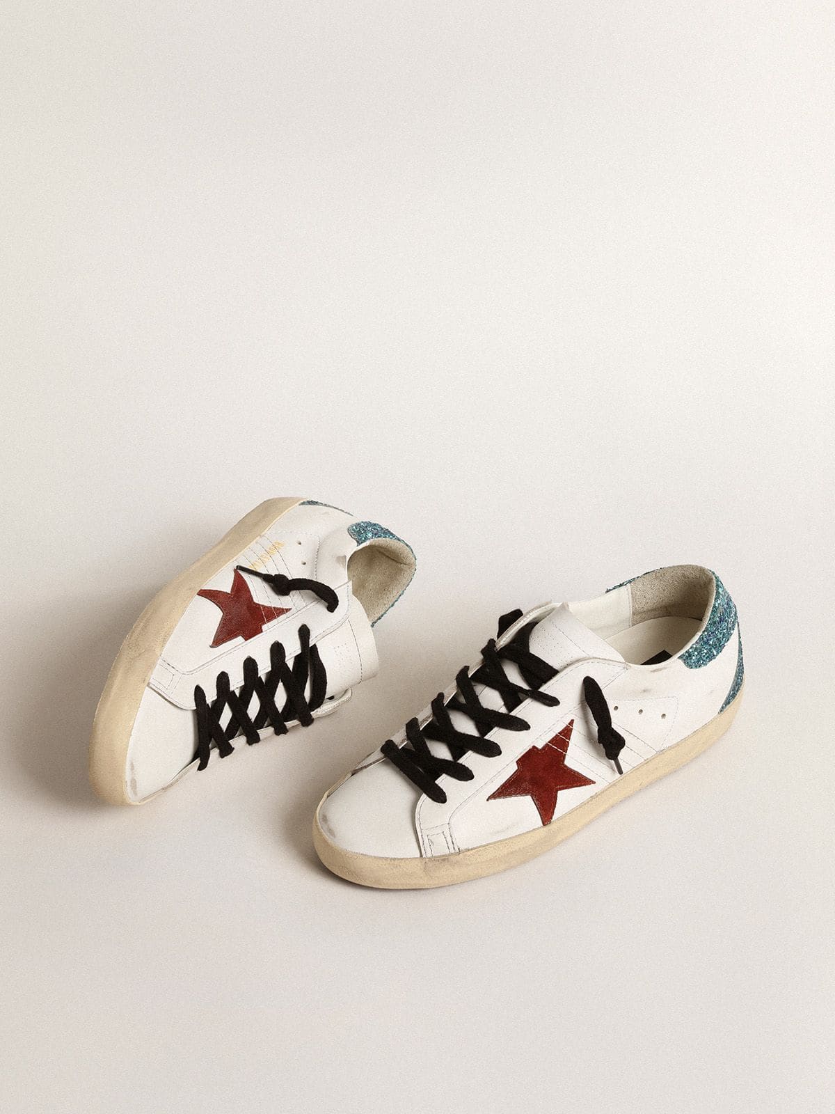 Golden Goose Women’s Super-Star with burgundy suede star and light blue glitter heel tab