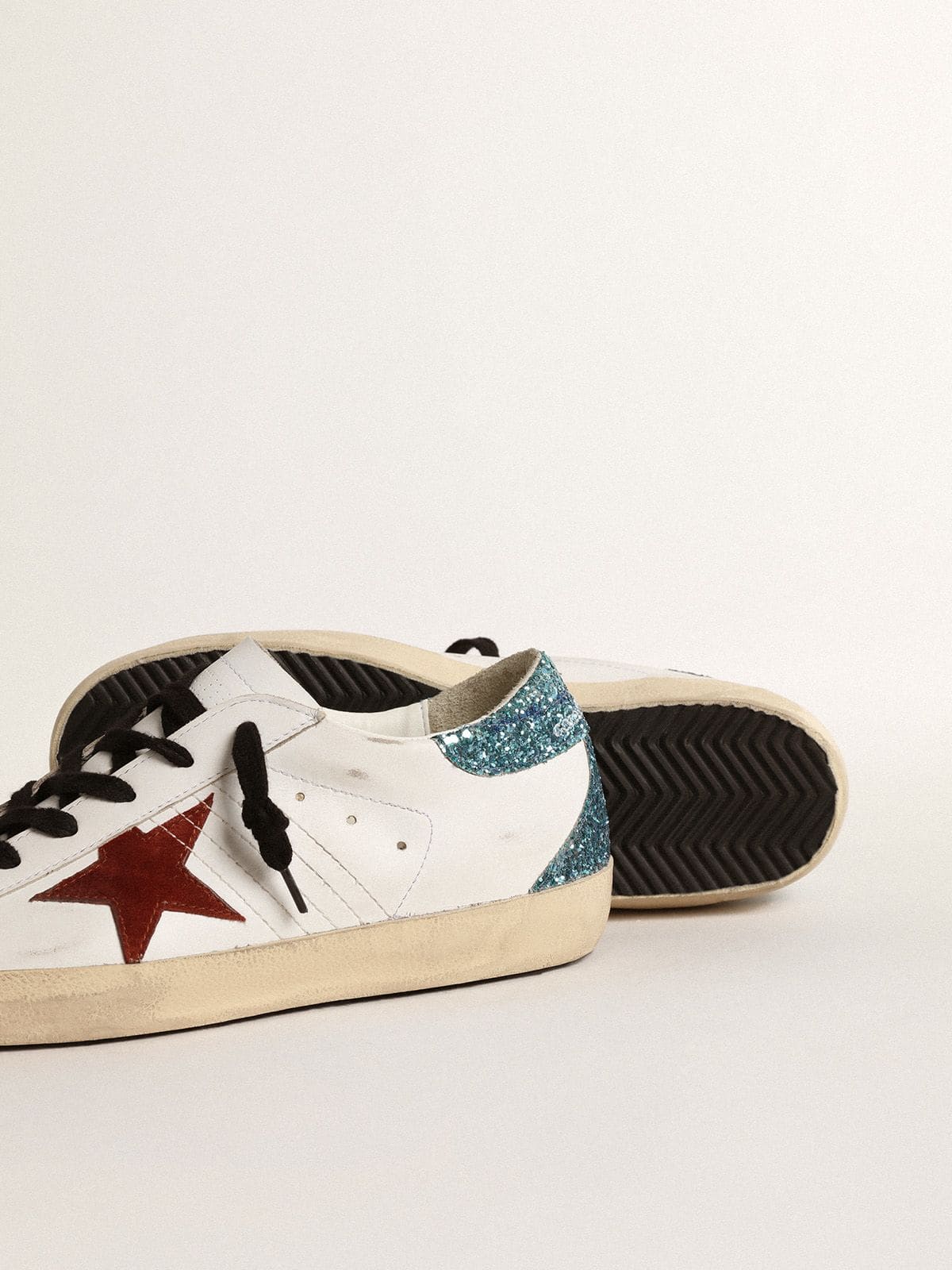 Golden Goose Women’s Super-Star with burgundy suede star and light blue glitter heel tab
