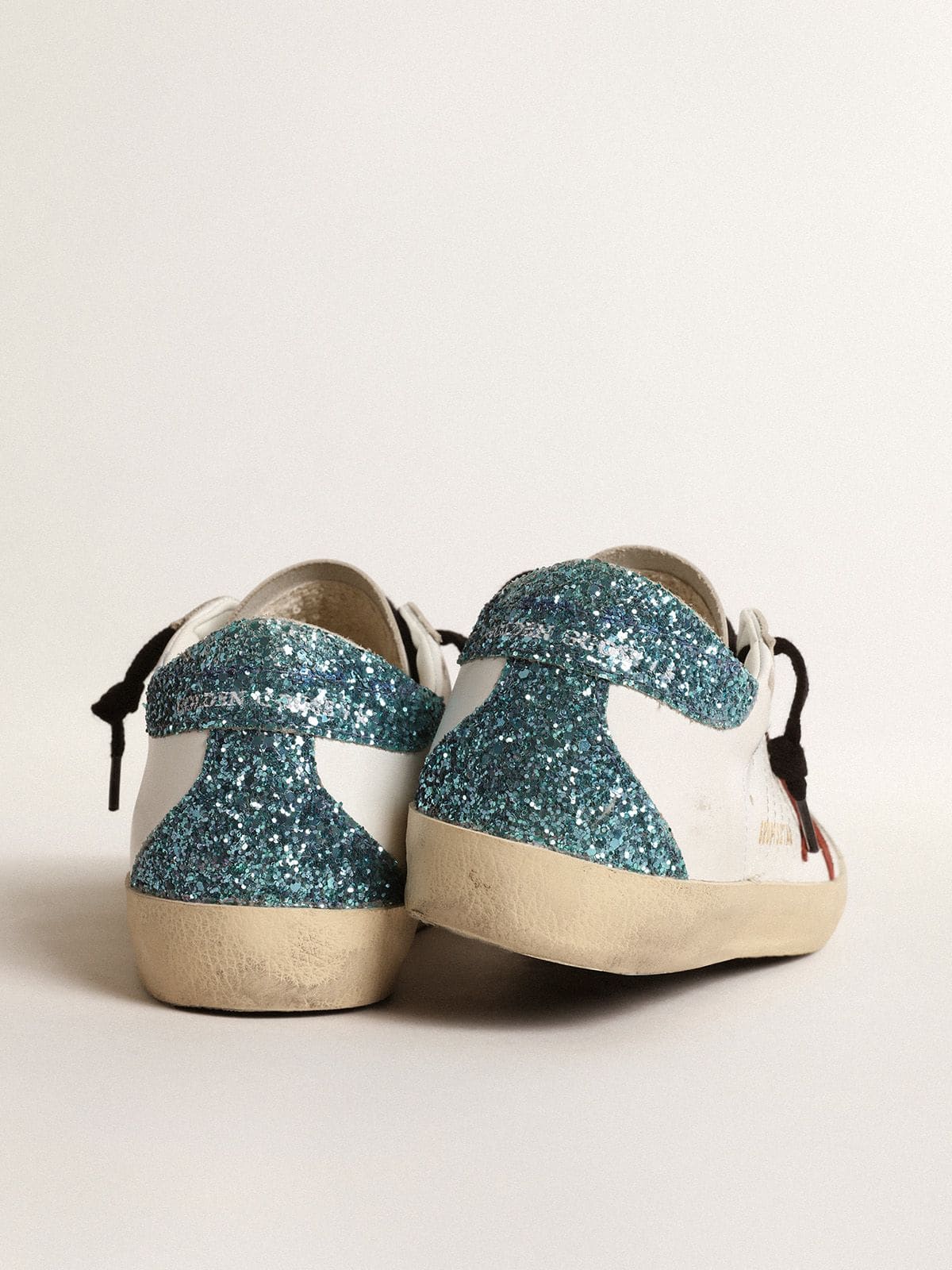 Golden Goose Women’s Super-Star with burgundy suede star and light blue glitter heel tab