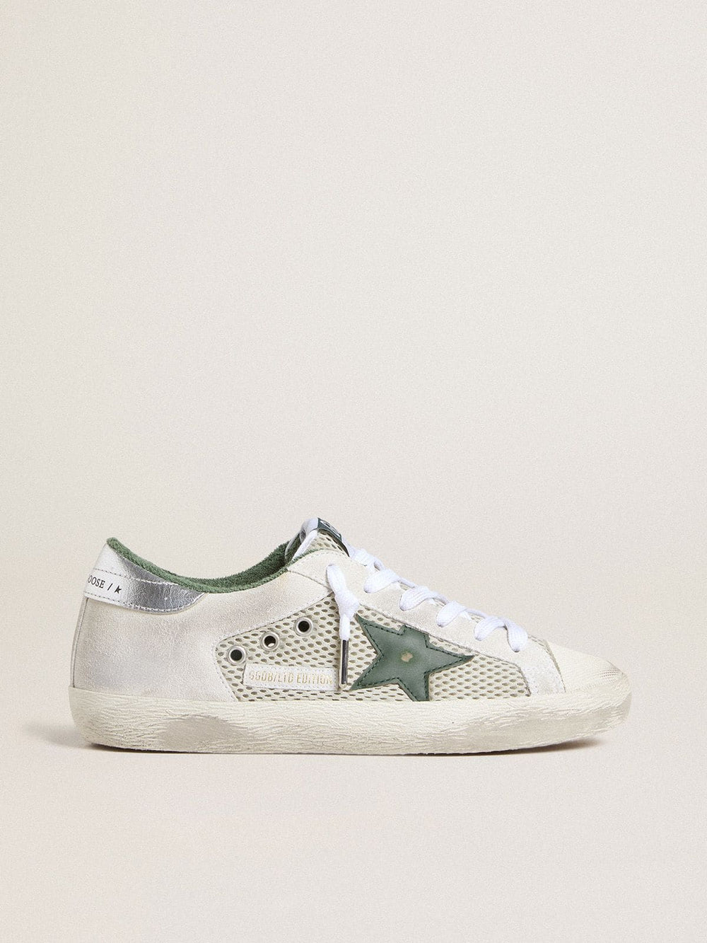 Golden Goose Women’s Super-Star LTD in white suede and mesh with green leather star and silver foiled leather heel tab