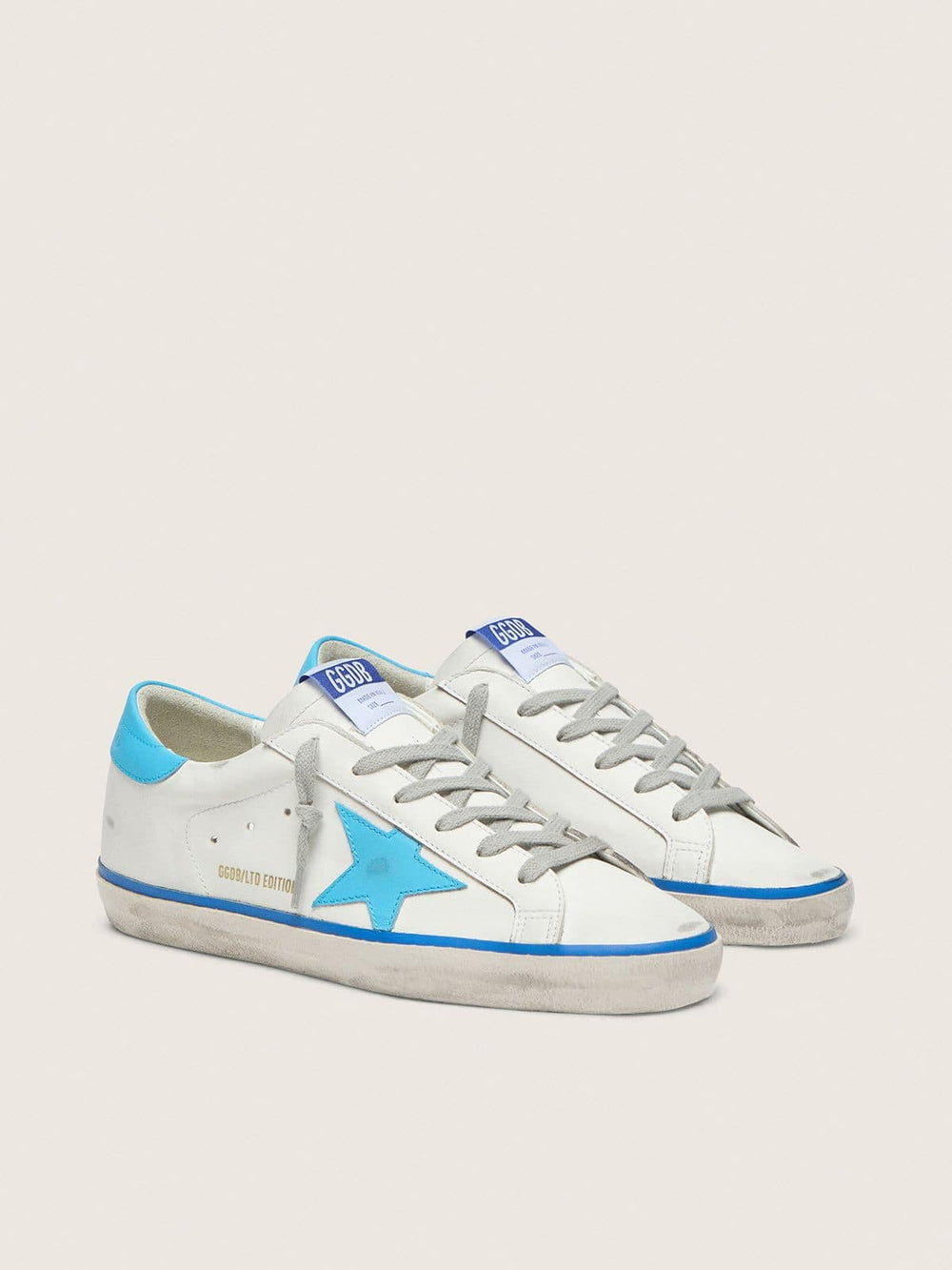 Golden Goose Women's Super-Star LTD in white leather with light blue leather star and heel tab