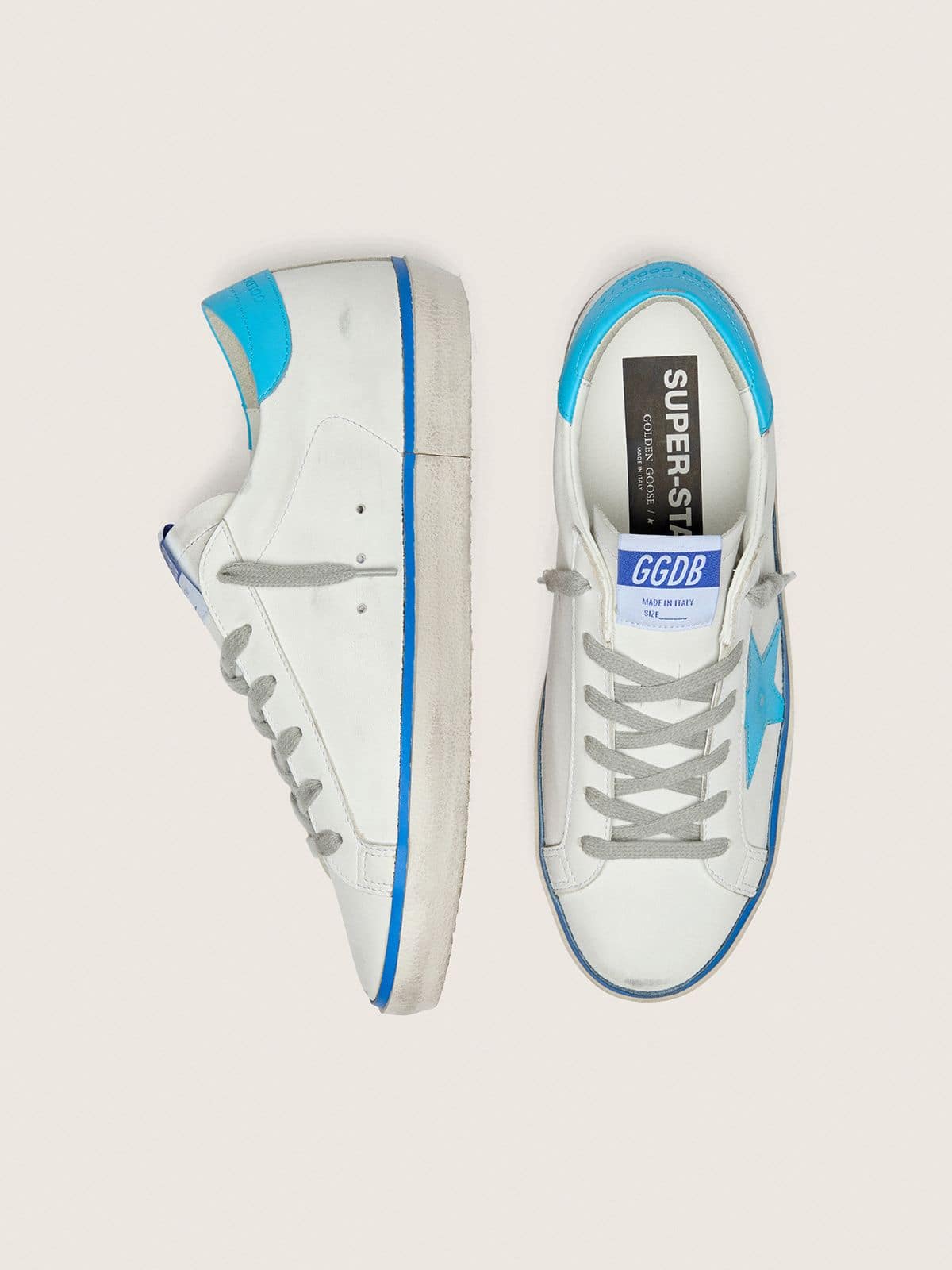 Golden Goose Women's Super-Star LTD in white leather with light blue leather star and heel tab