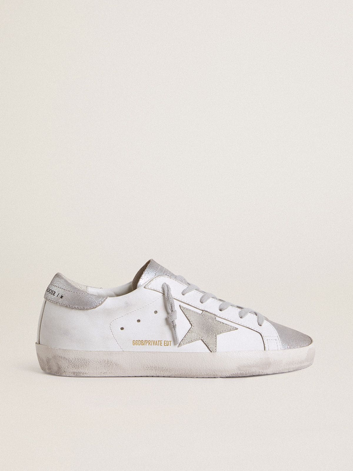 Golden Goose Women’s Super-Star with gray suede star and silver glitter inserts