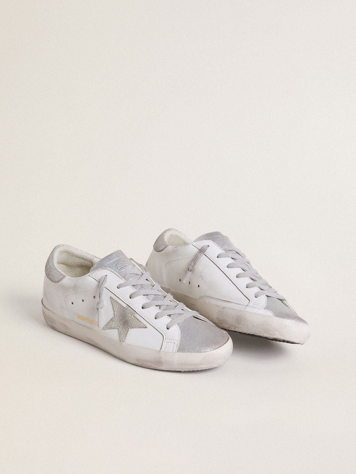 Golden Goose Women’s Super-Star with gray suede star and silver glitter inserts