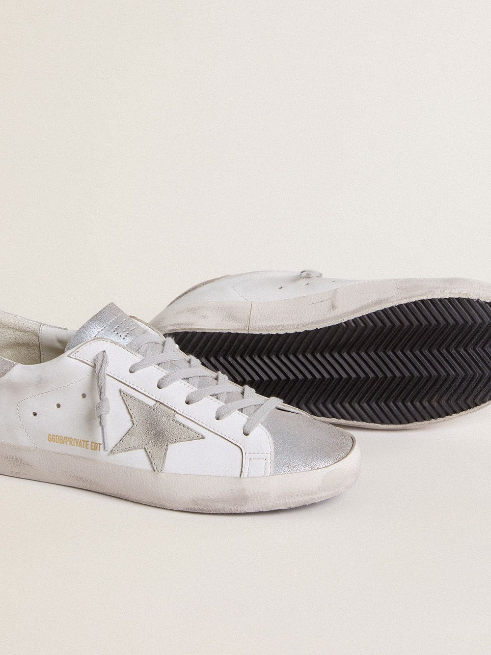 Golden Goose Women’s Super-Star with gray suede star and silver glitter inserts