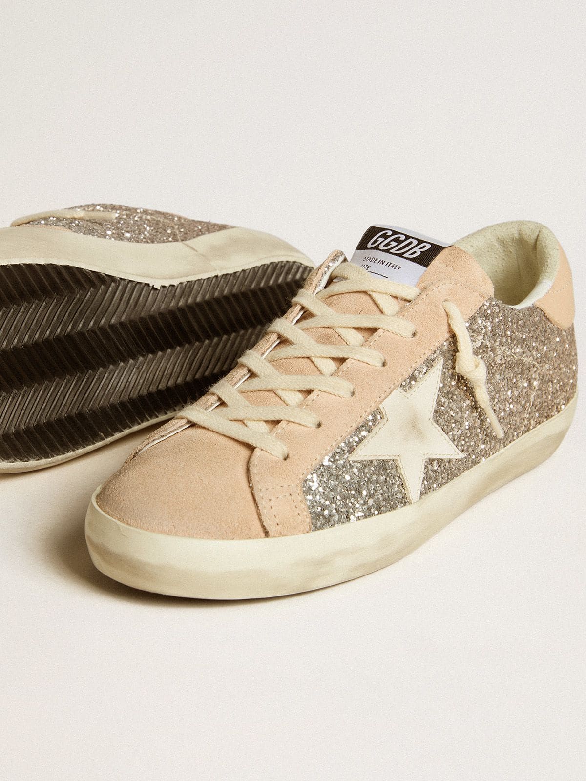 Golden Goose Women’s Super-Star in silver glitter with leather star and heel tab