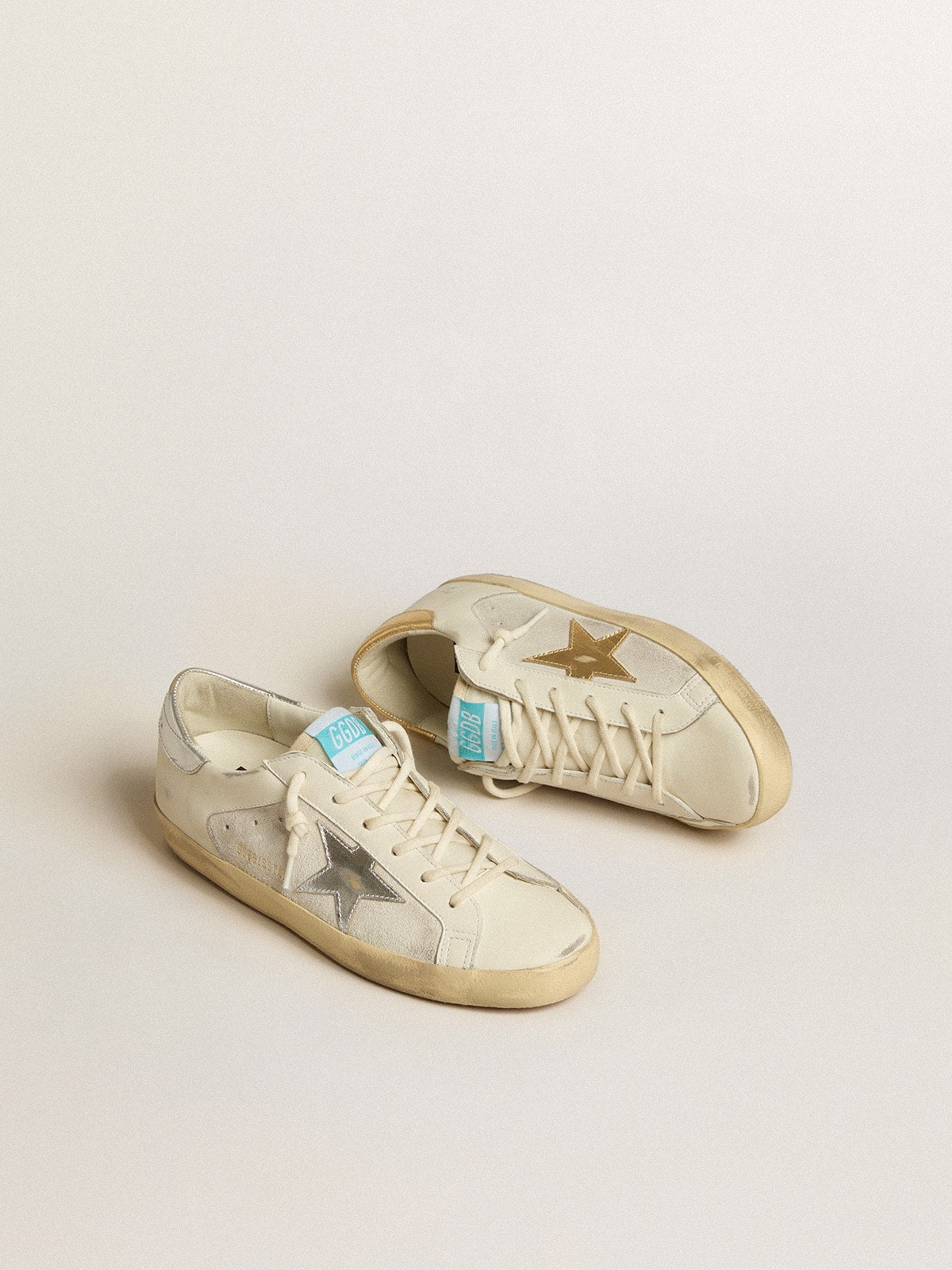 Golden Goose Super-Star in white leather and suede with silver and gold leather star