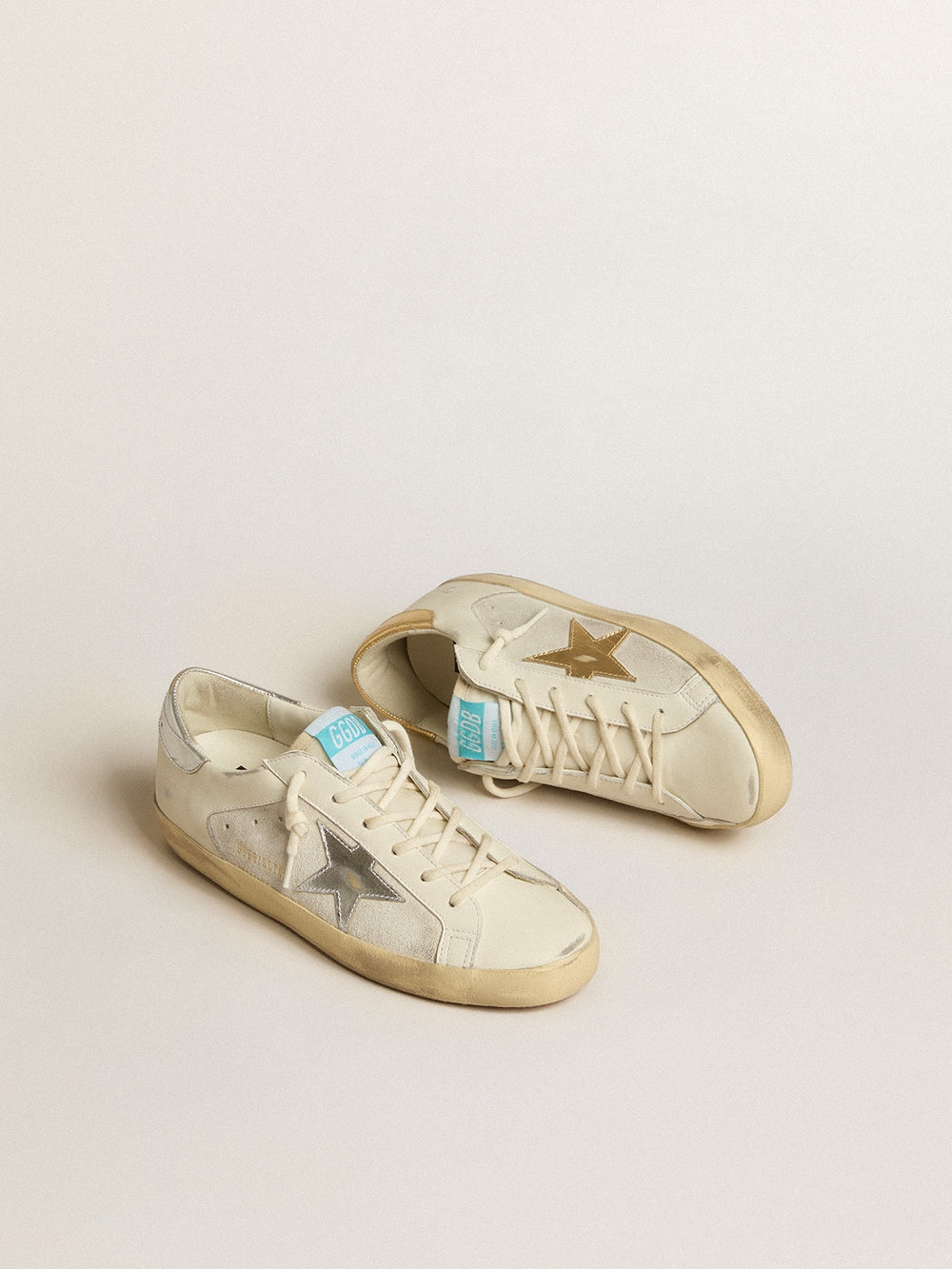 Golden Goose Super-Star in white leather and suede with silver and gold leather star
