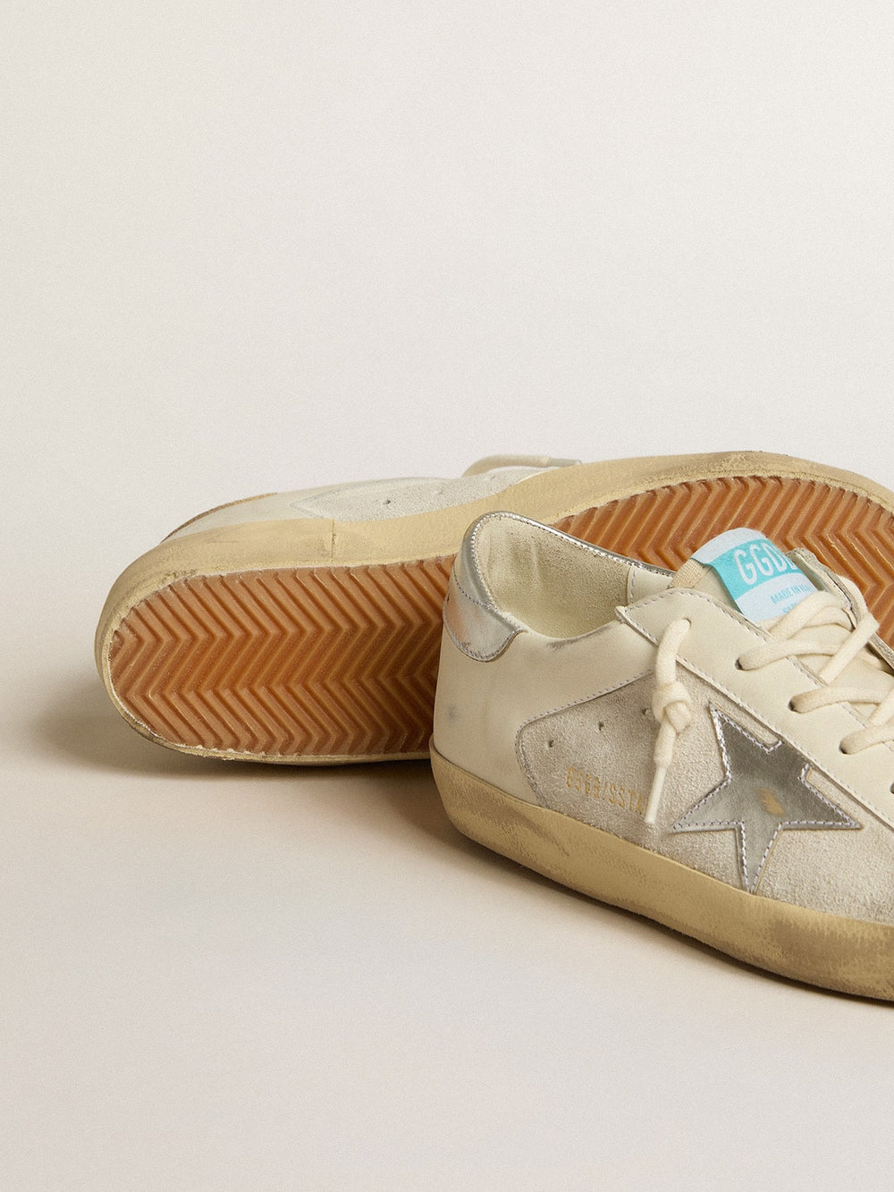 Golden Goose Super-Star in white leather and suede with silver and gold leather star