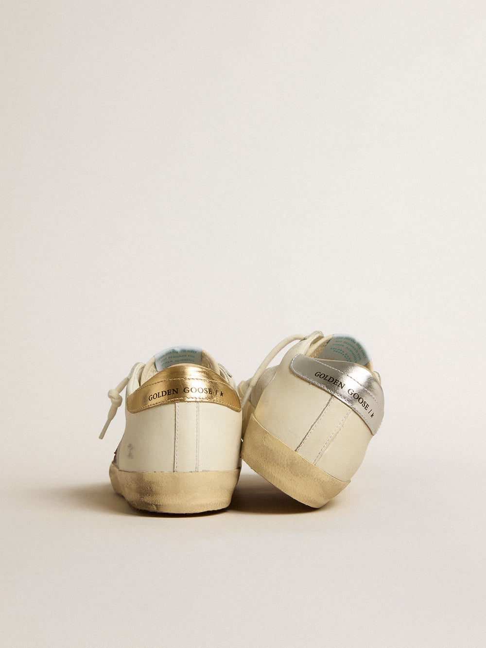 Golden Goose Super-Star in white leather and suede with silver and gold leather star