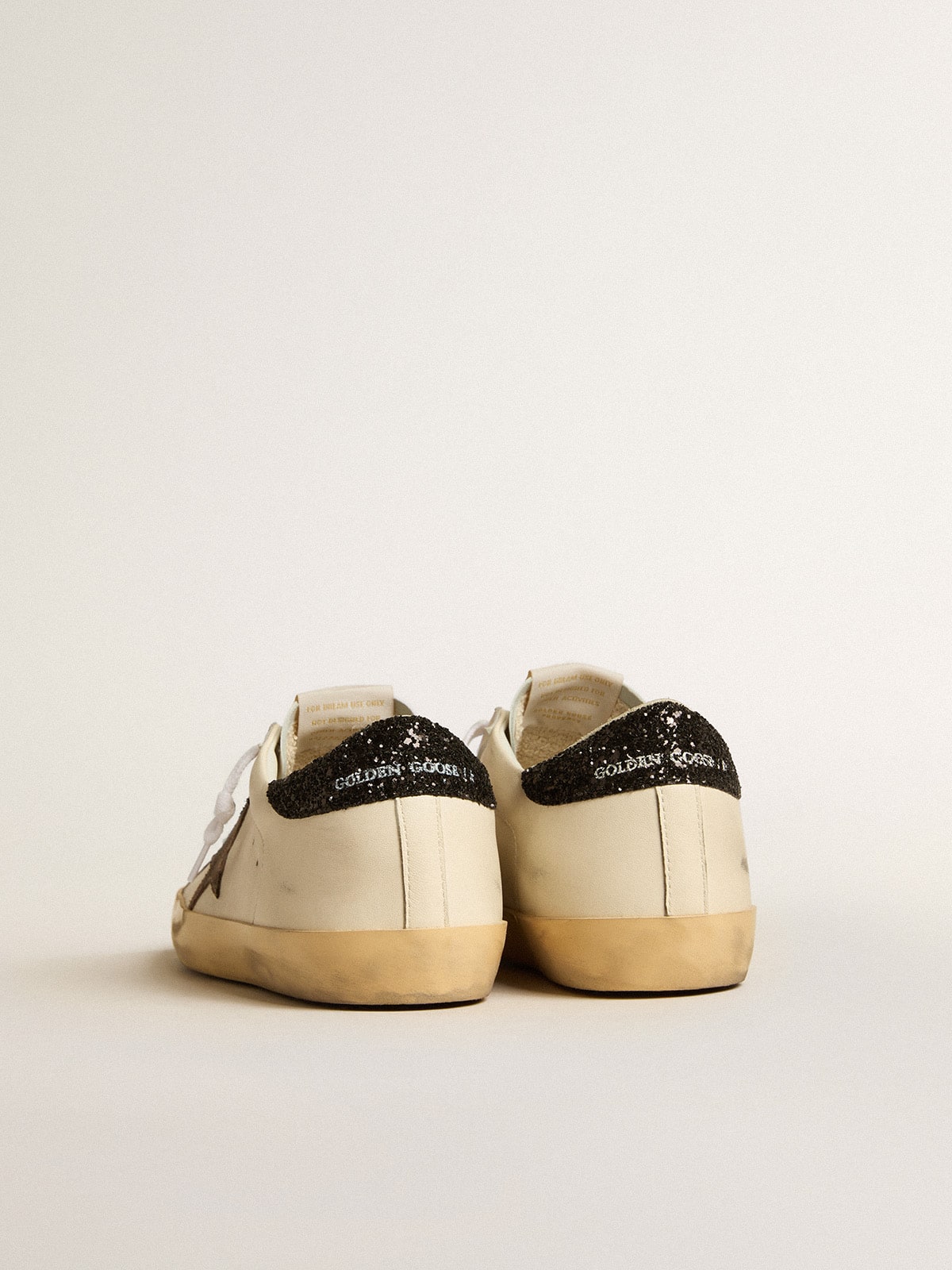 Golden Goose Super-Star LTD with laminated leather star and black glitter heel tab