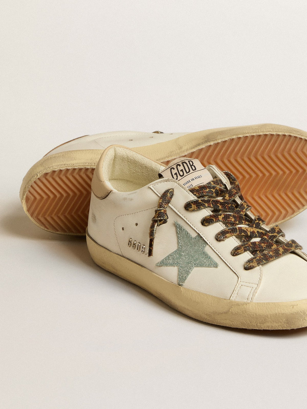 Golden Goose Women's Super-Star with gray glitter star and nude leather heel tab
