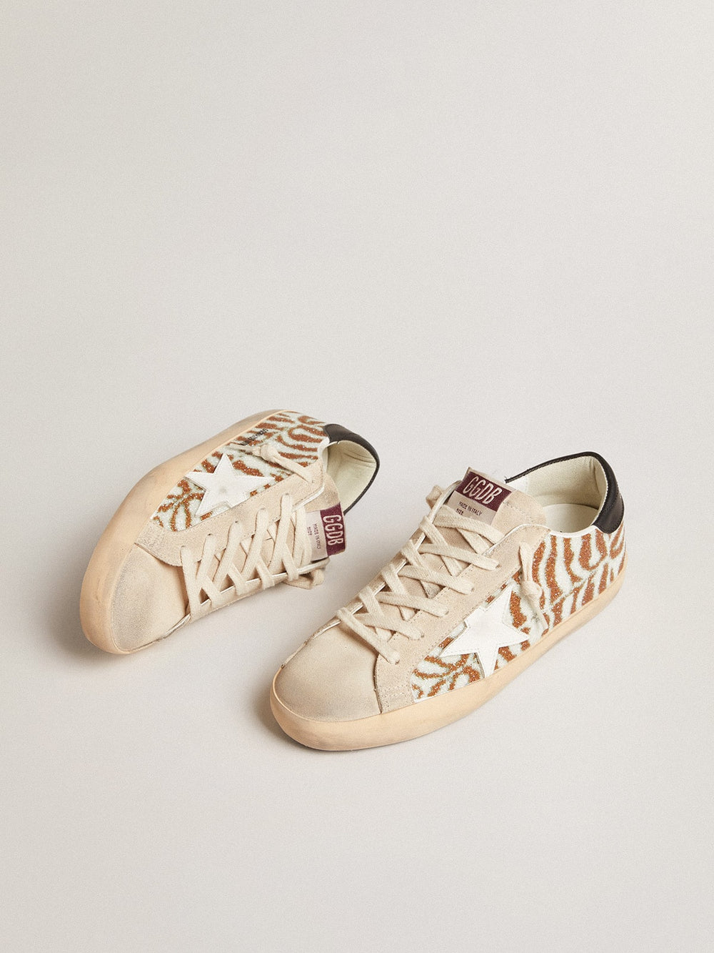 Golden Goose Super-Star  in zebra-effect Swarovski with a white leather star