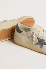 Golden Goose Super-Star  with cream-colored leather star with Swarovski crystals and blue leather heel tab with lizard print