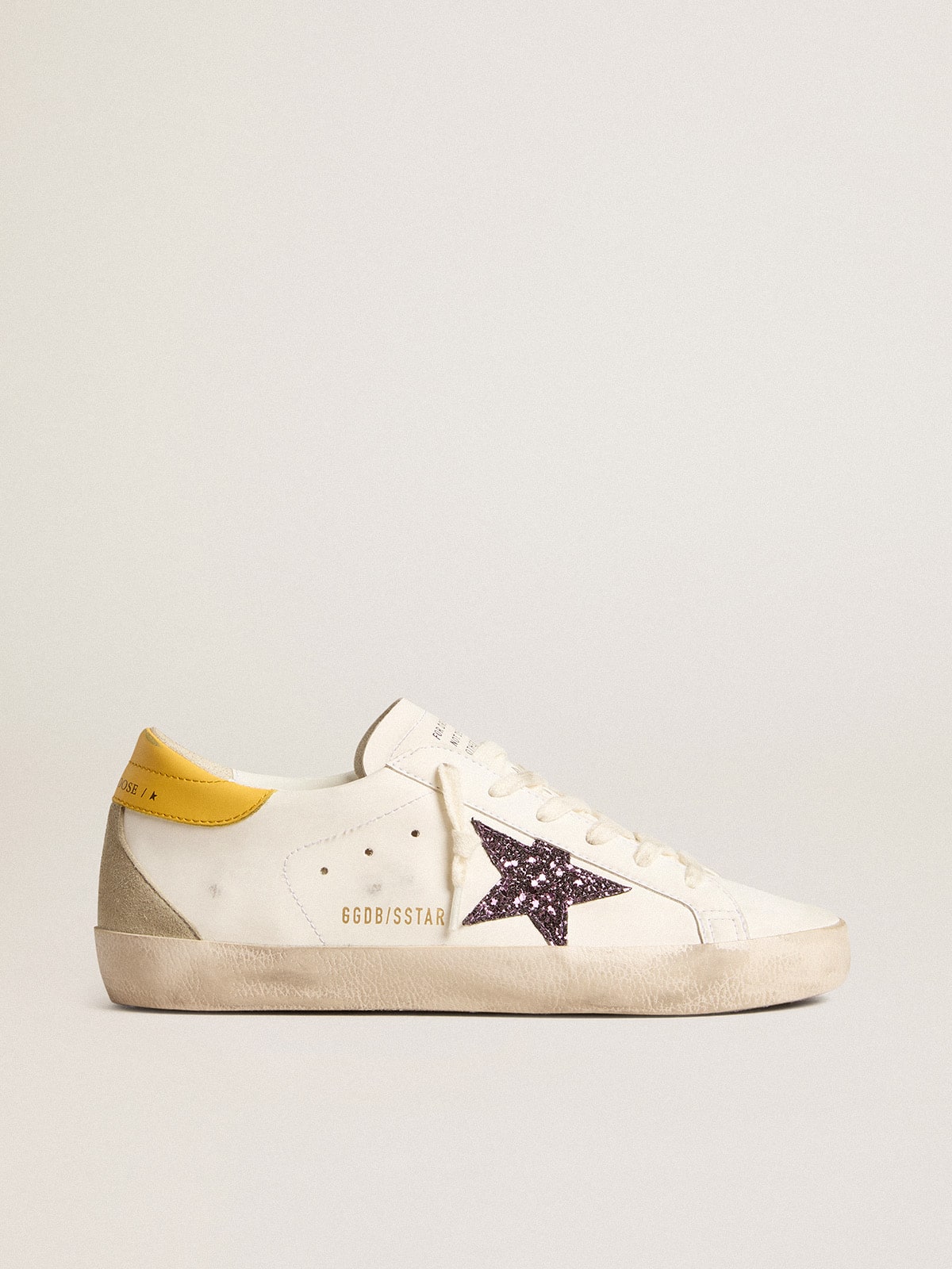 Golden Goose Women’s Bio-based Super-Star with red glitter star and leather heel tab
