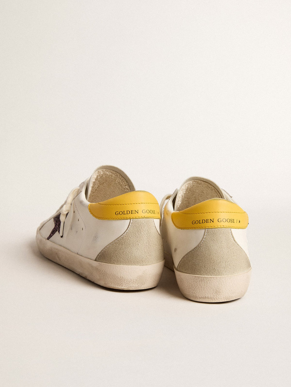 Golden Goose Women’s Bio-based Super-Star with red glitter star and leather heel tab