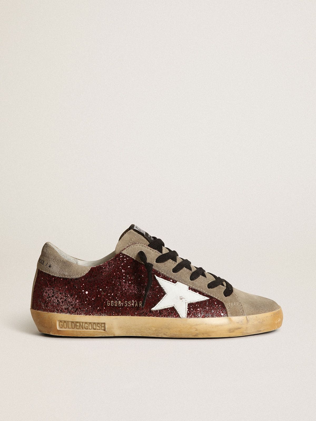 Golden Goose Women's Super-Star in burgundy glitter with white leather star and dove-gray suede tongue