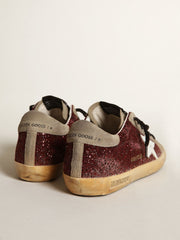 Golden Goose Women's Super-Star in burgundy glitter with white leather star and dove-gray suede tongue