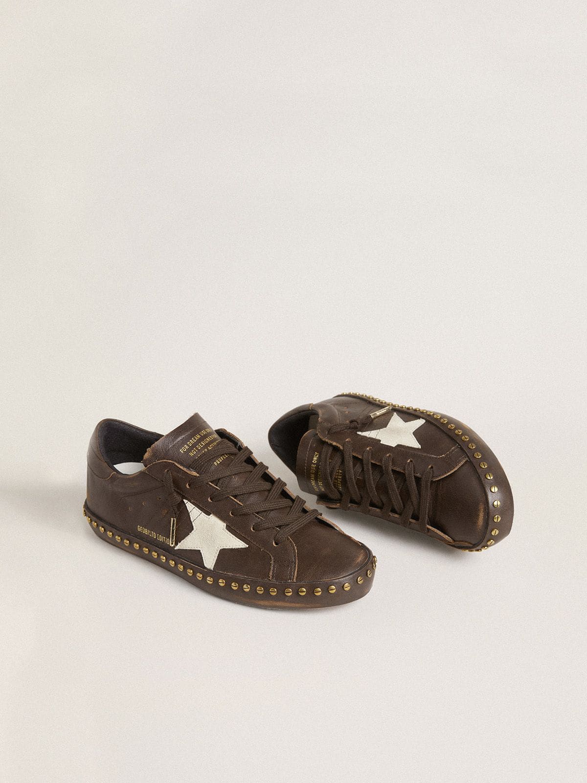 Golden Goose Women’s Super-Star LTD in dark brown leather with cream suede star and studs