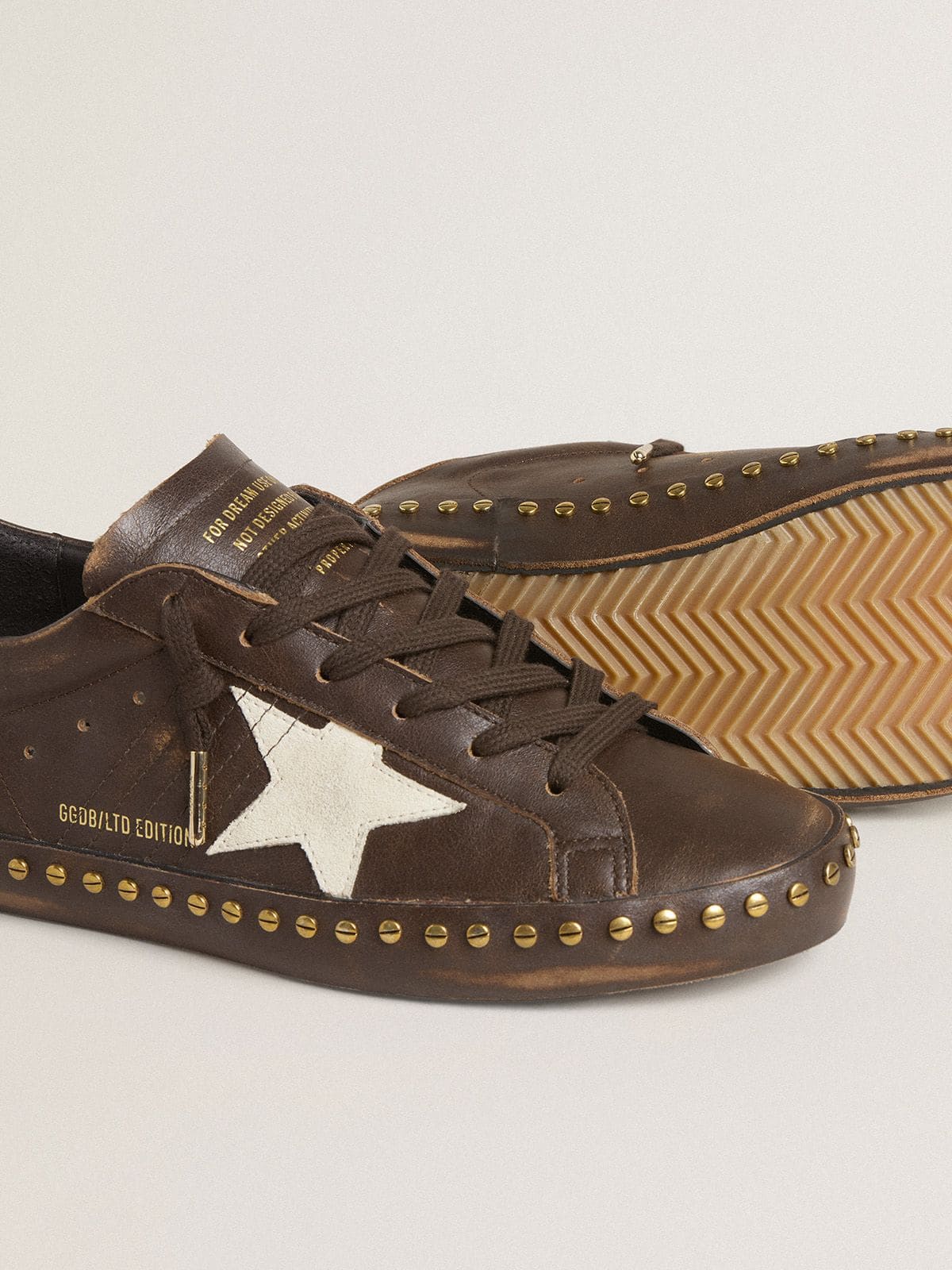 Golden Goose Women’s Super-Star LTD in dark brown leather with cream suede star and studs