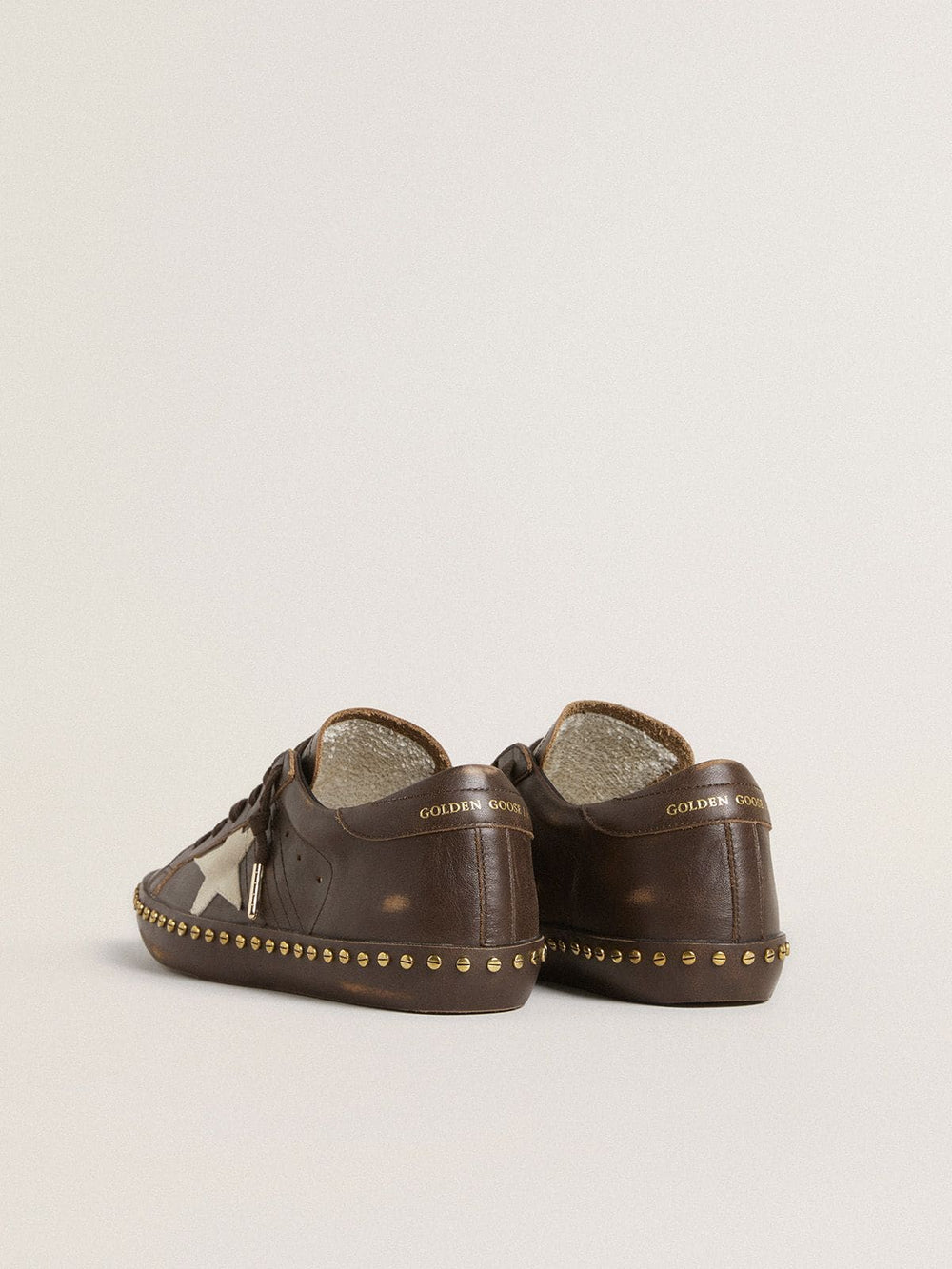 Golden Goose Women’s Super-Star LTD in dark brown leather with cream suede star and studs