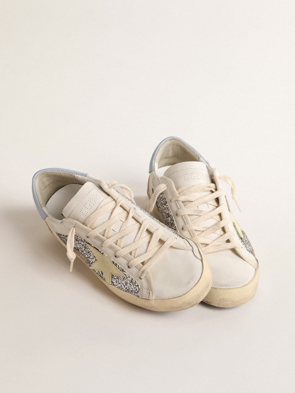 Golden Goose Bio-based Super-Star with silver glitter and yellow leather star