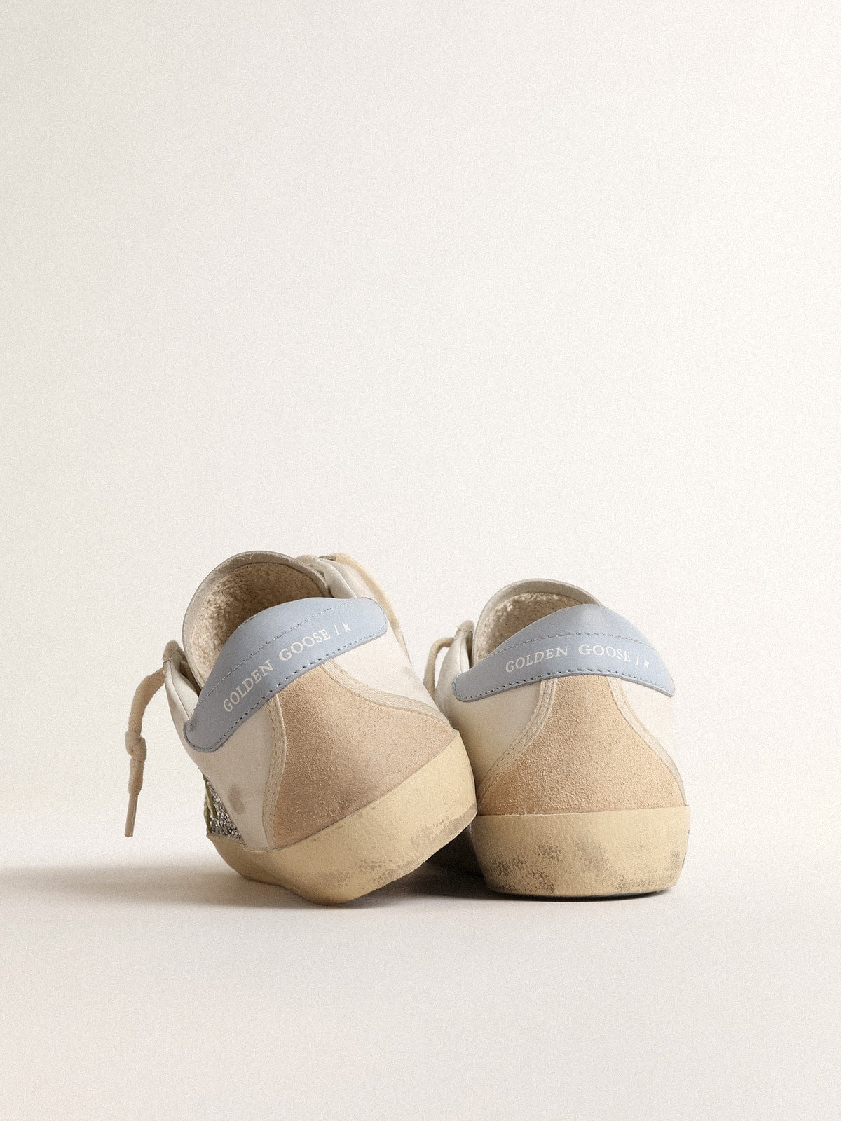 Golden Goose Bio-based Super-Star with silver glitter and yellow leather star