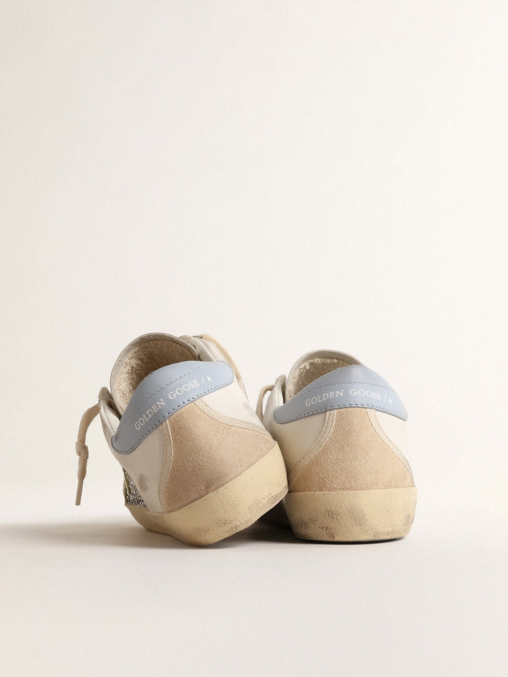 Golden Goose Bio-based Super-Star with silver glitter and yellow leather star