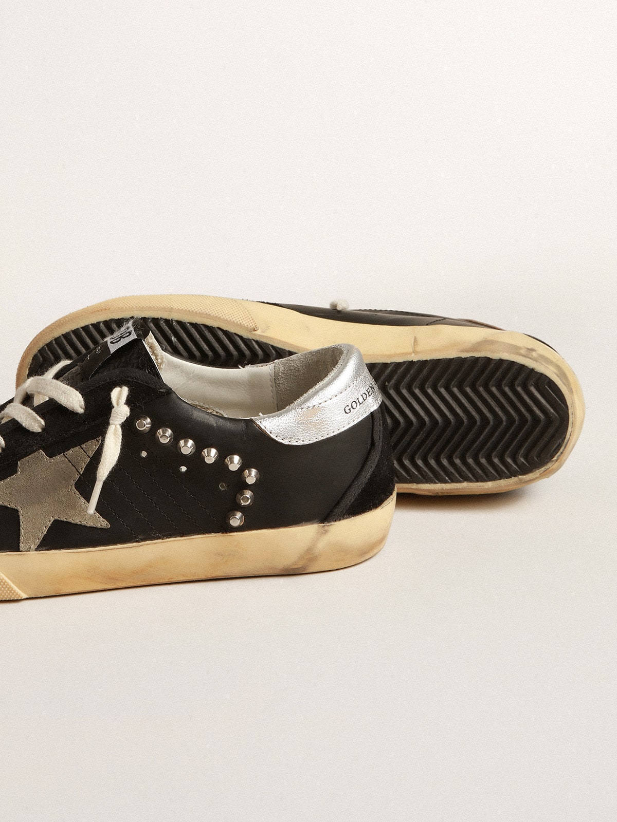 Golden Goose Women’s Super-Star in black leather and suede with silver studs