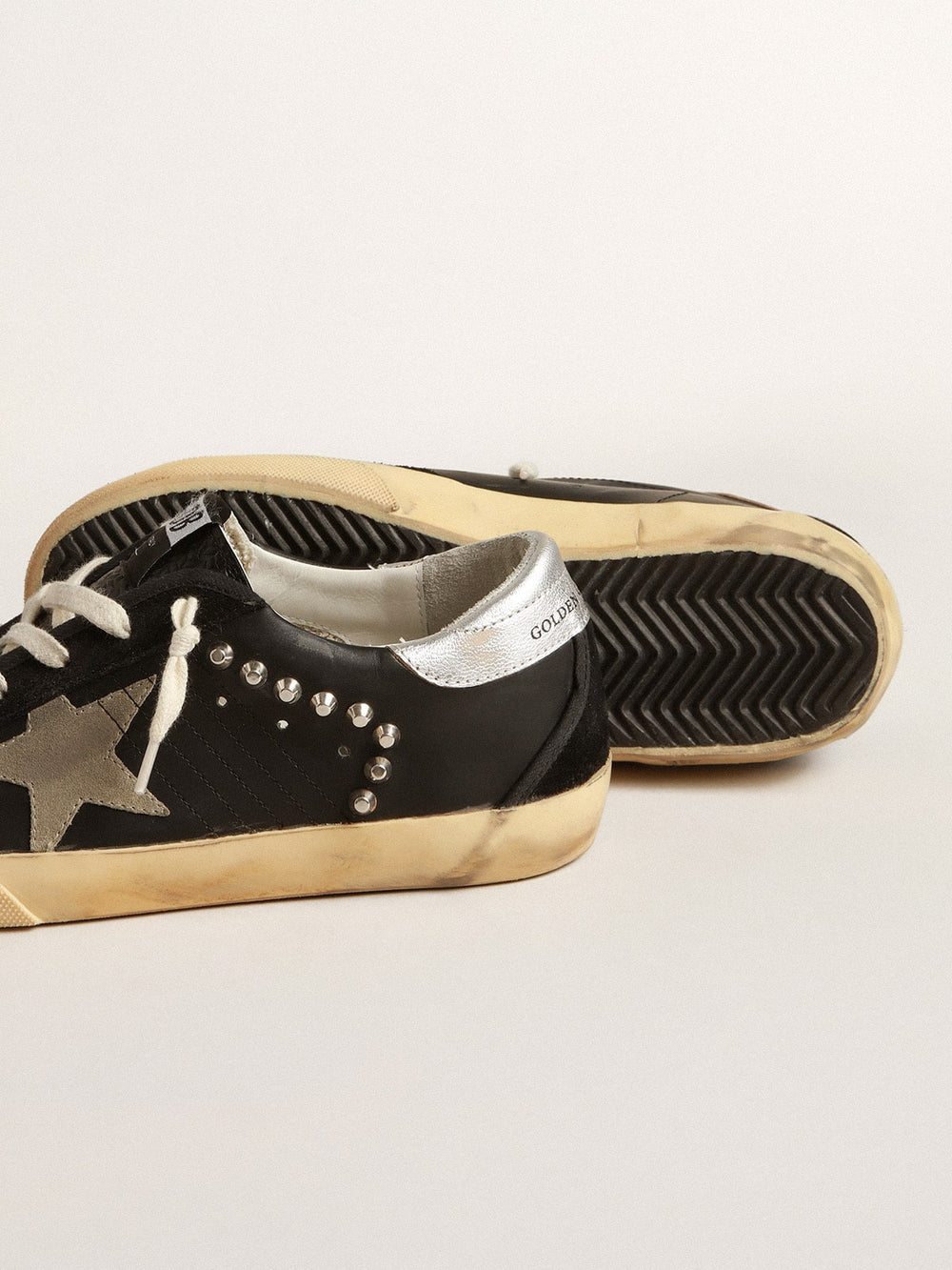 Golden Goose Women’s Super-Star in black leather and suede with silver studs