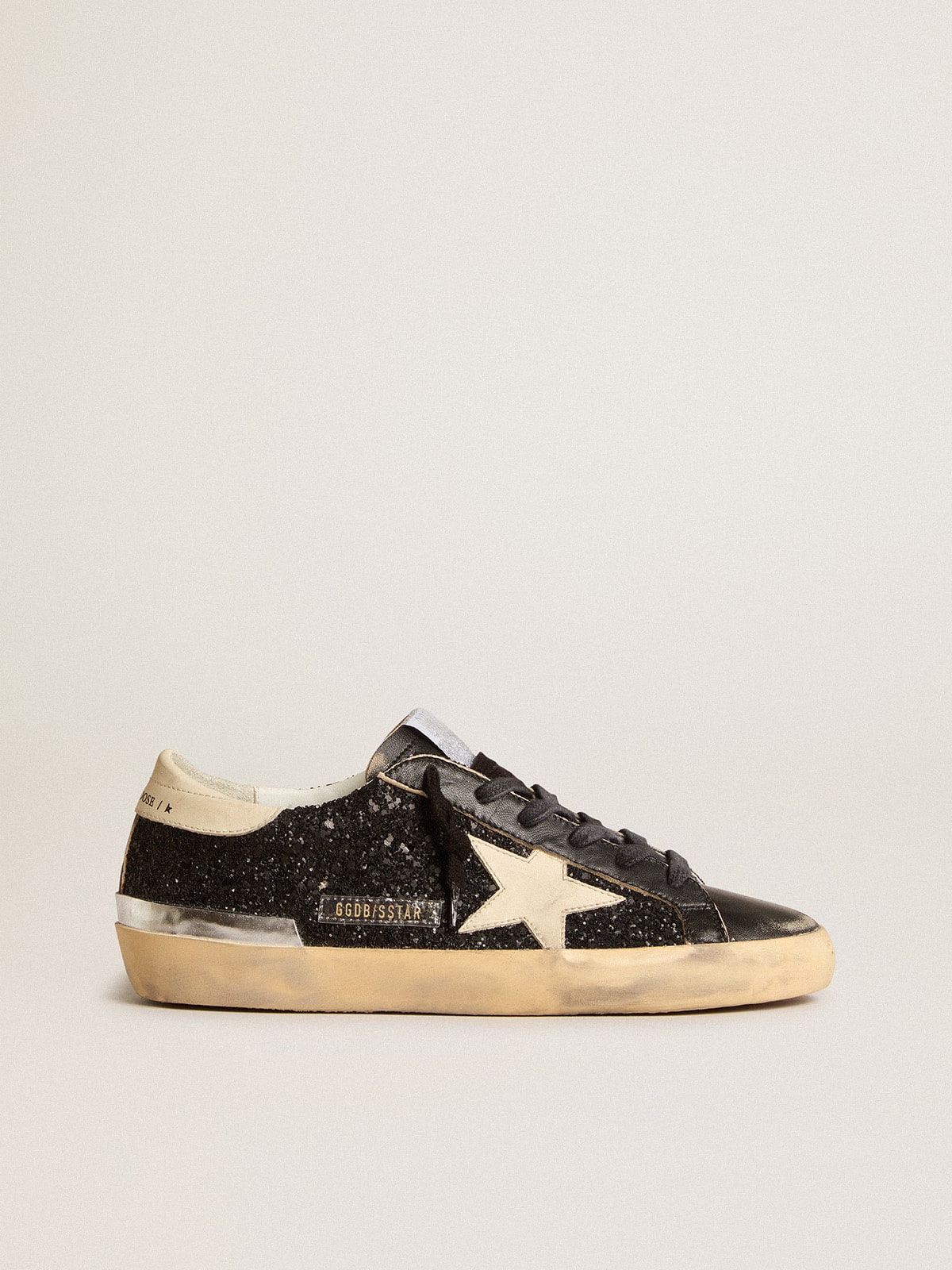 Golden Goose Women's Super-Star in black glitter and nappa with cream leather star and heel tab