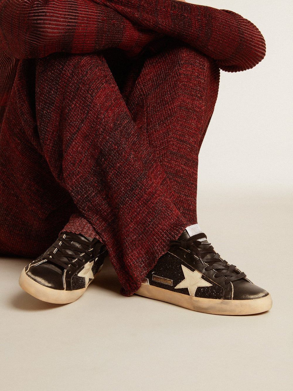 Golden Goose Women's Super-Star in black glitter and nappa with cream leather star and heel tab