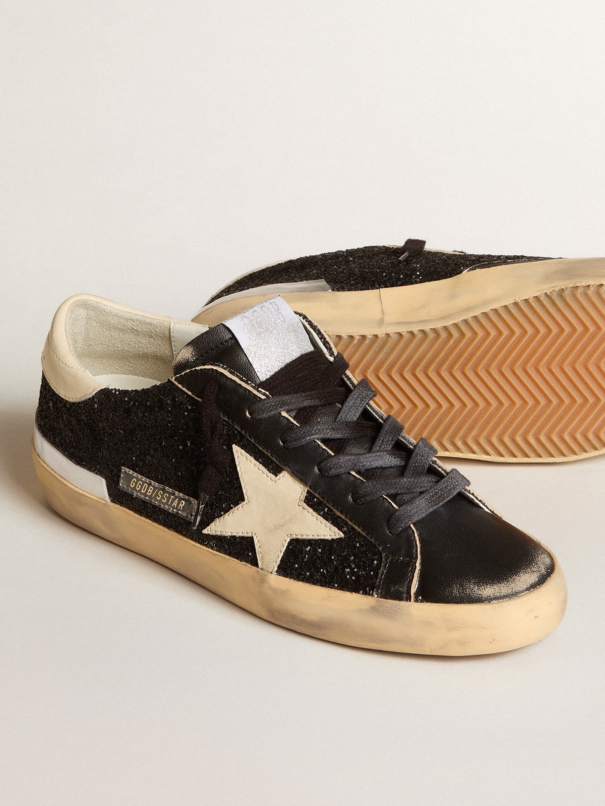 Golden Goose Women's Super-Star in black glitter and nappa with cream leather star and heel tab