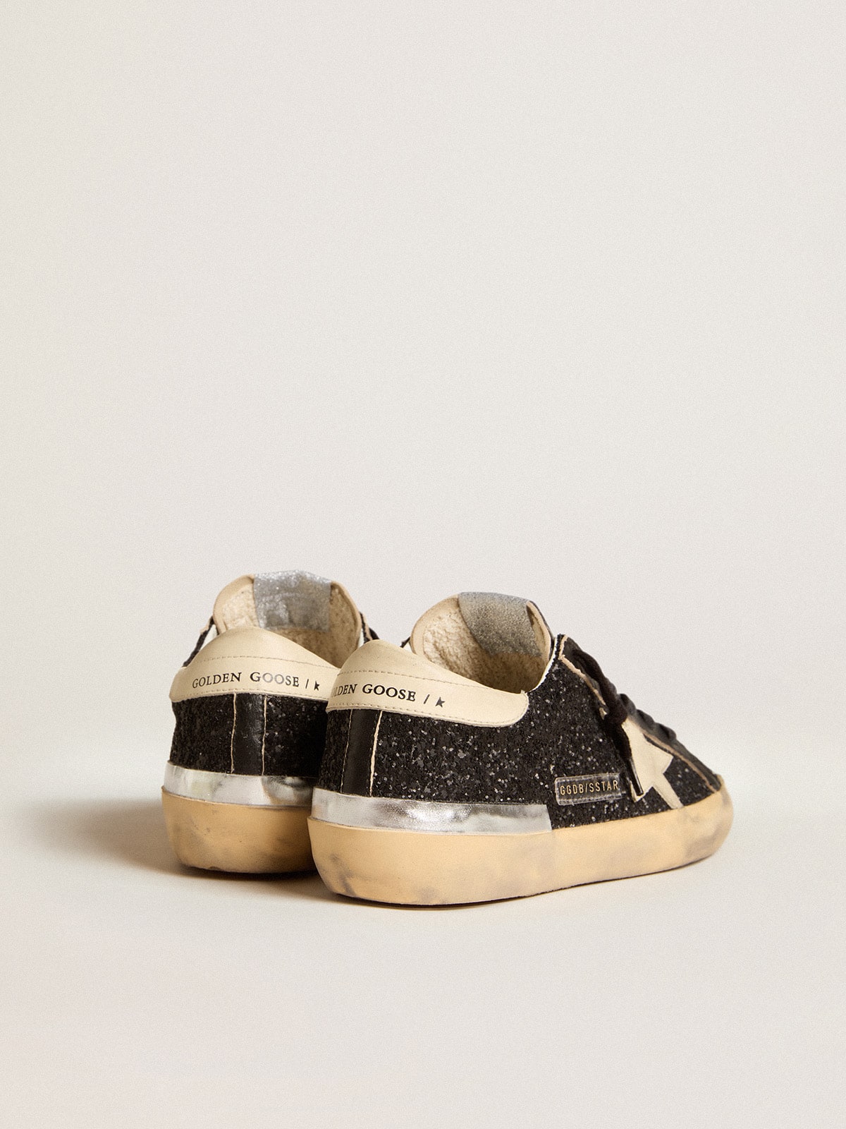 Golden Goose Women's Super-Star in black glitter and nappa with cream leather star and heel tab