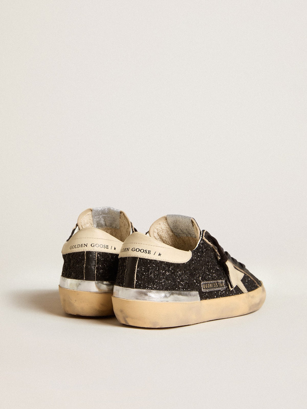 Golden Goose Women's Super-Star in black glitter and nappa with cream leather star and heel tab