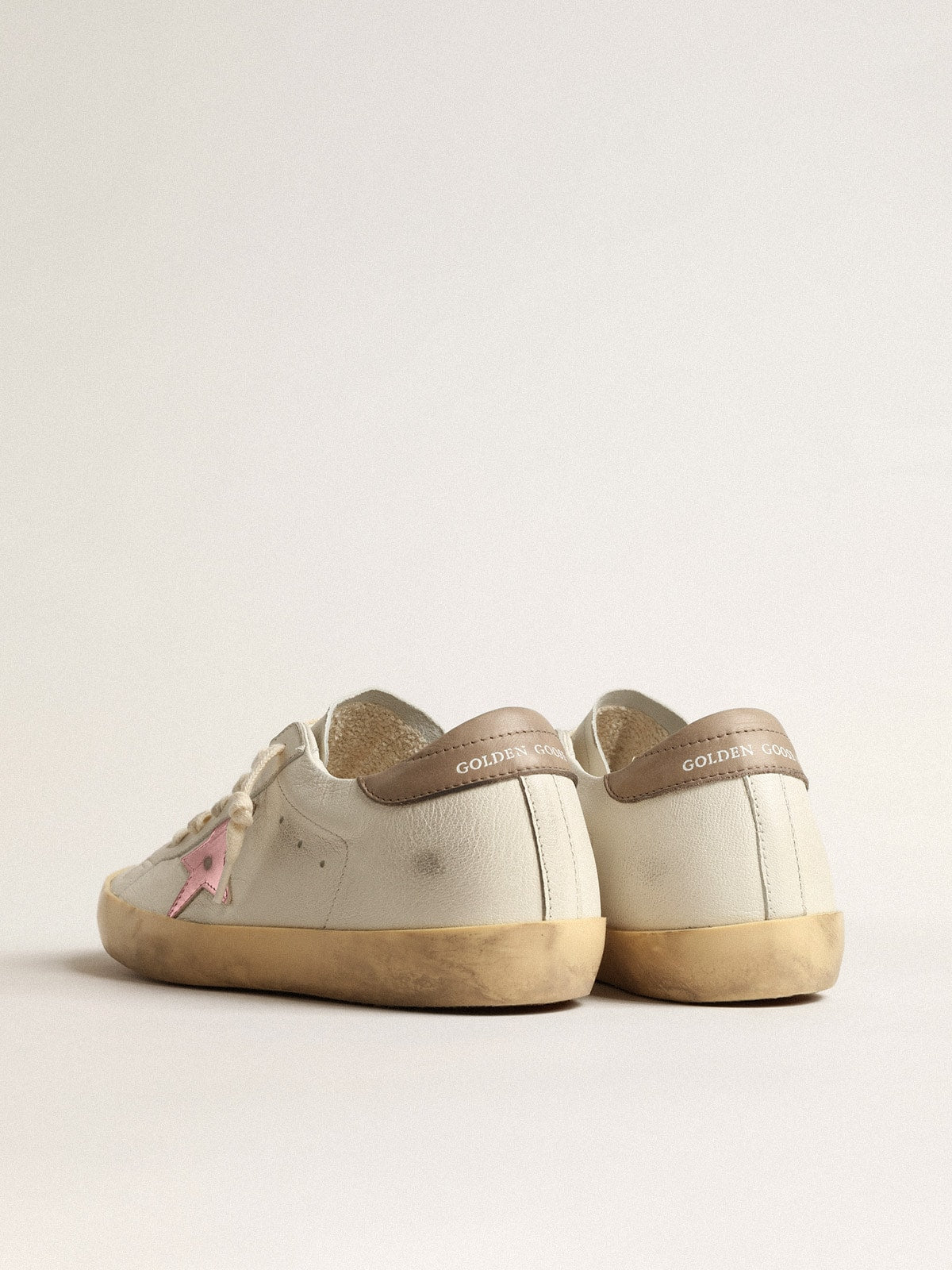 Golden Goose Women's Super-Star in white nappa with pink metallic leather star